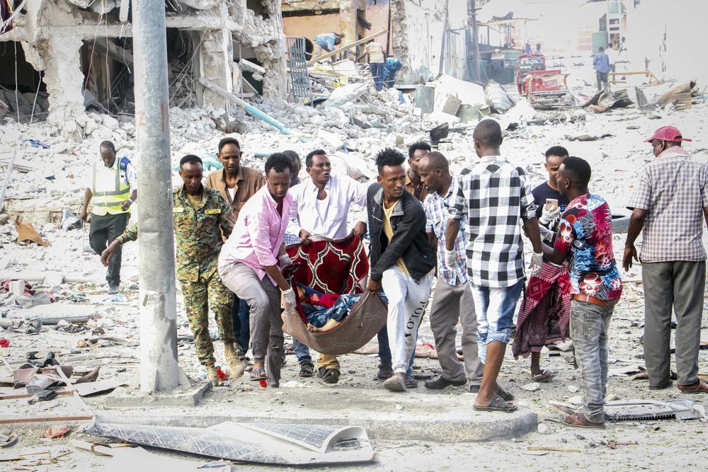 President of Somalia says at least 100 killed in car bombings