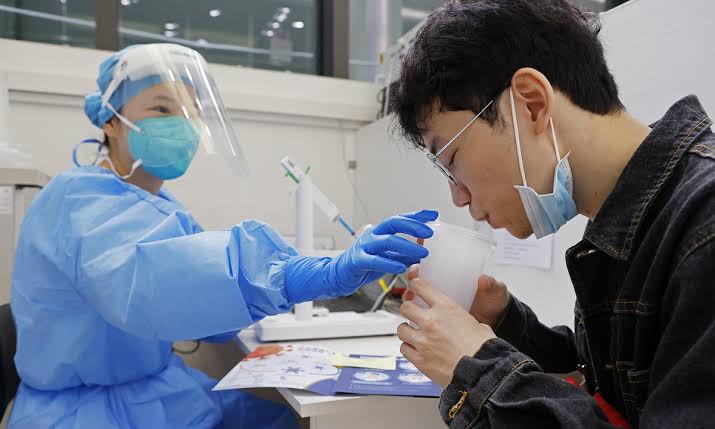 China optimizes COVID-19