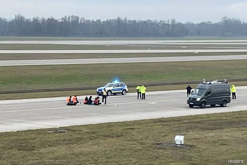 Climate activists stage protests at 2 German airports