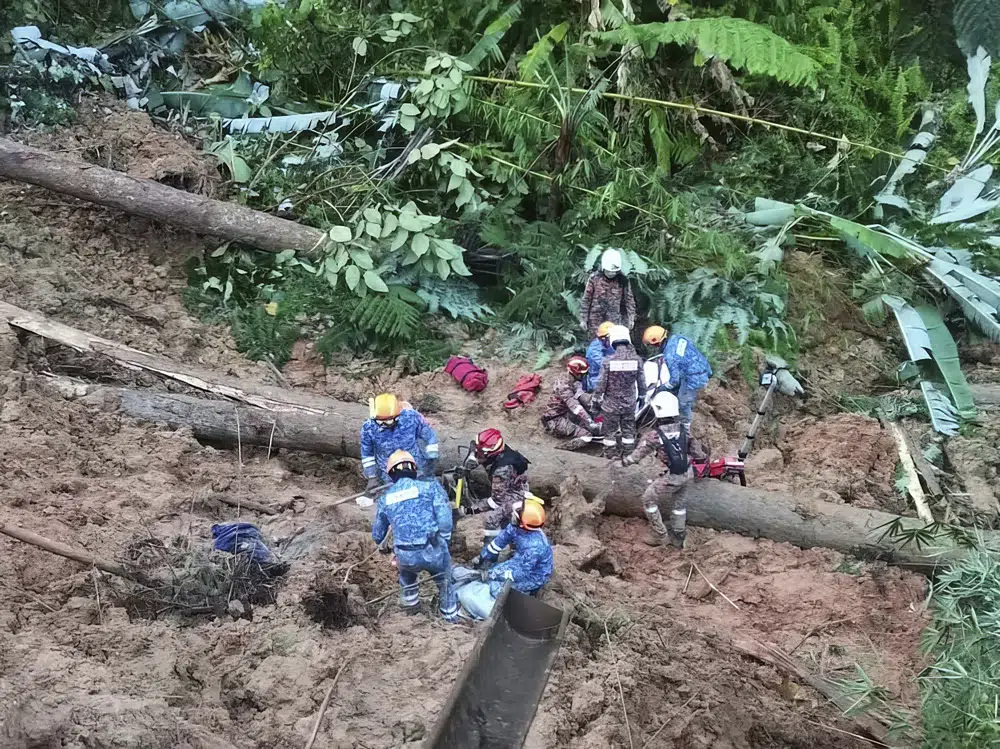 Landslide at Malaysia campground leaves 9 dead, 25 missing