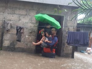 Philippines floods force tens of thousands to evacuate homes