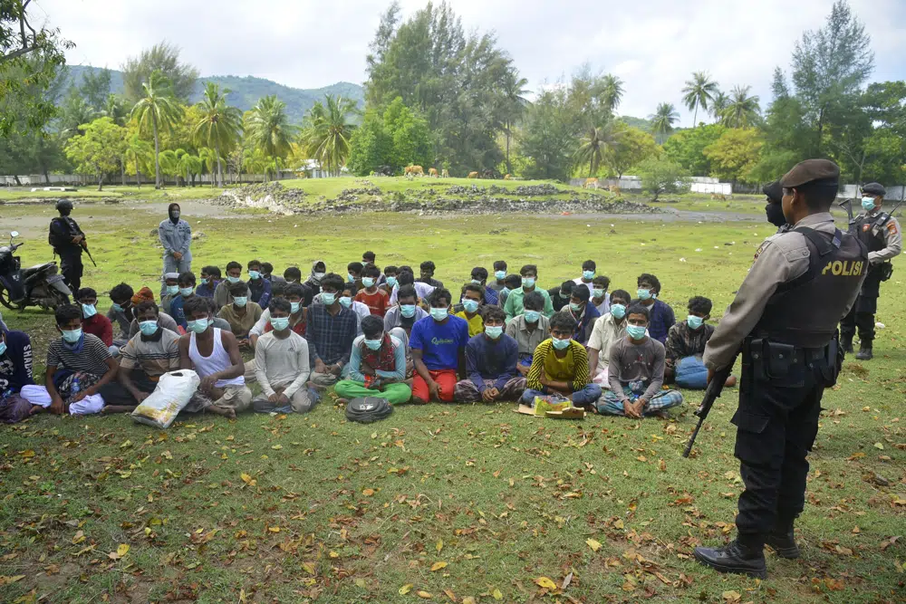 Dozens of Rohingya muslims land on beach in Aceh, Indonesia