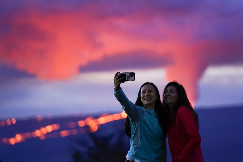 Viewers flock to watch glowing lava ooze from Hawaii volcano