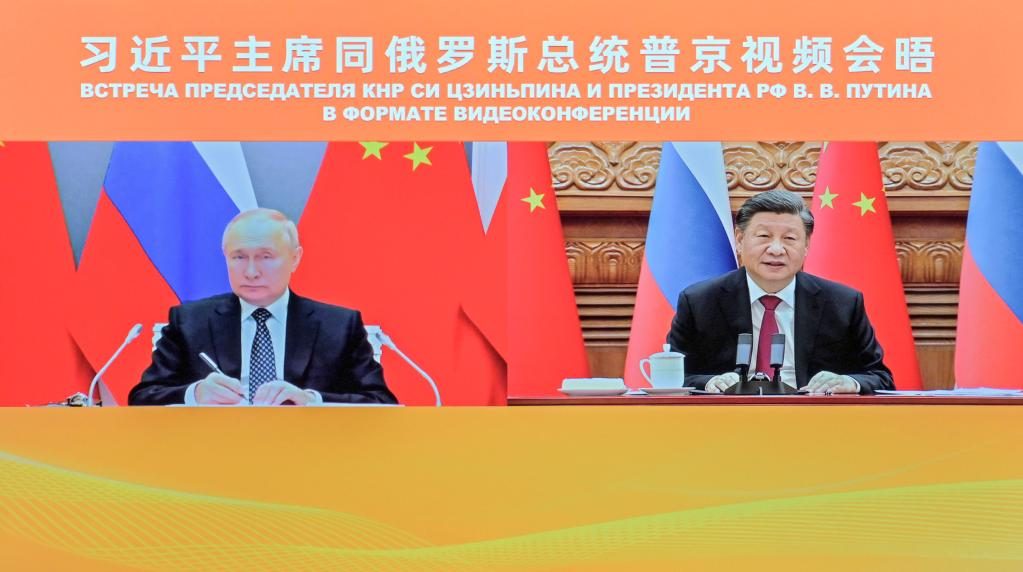 President Xi meets Russian Putin via video link