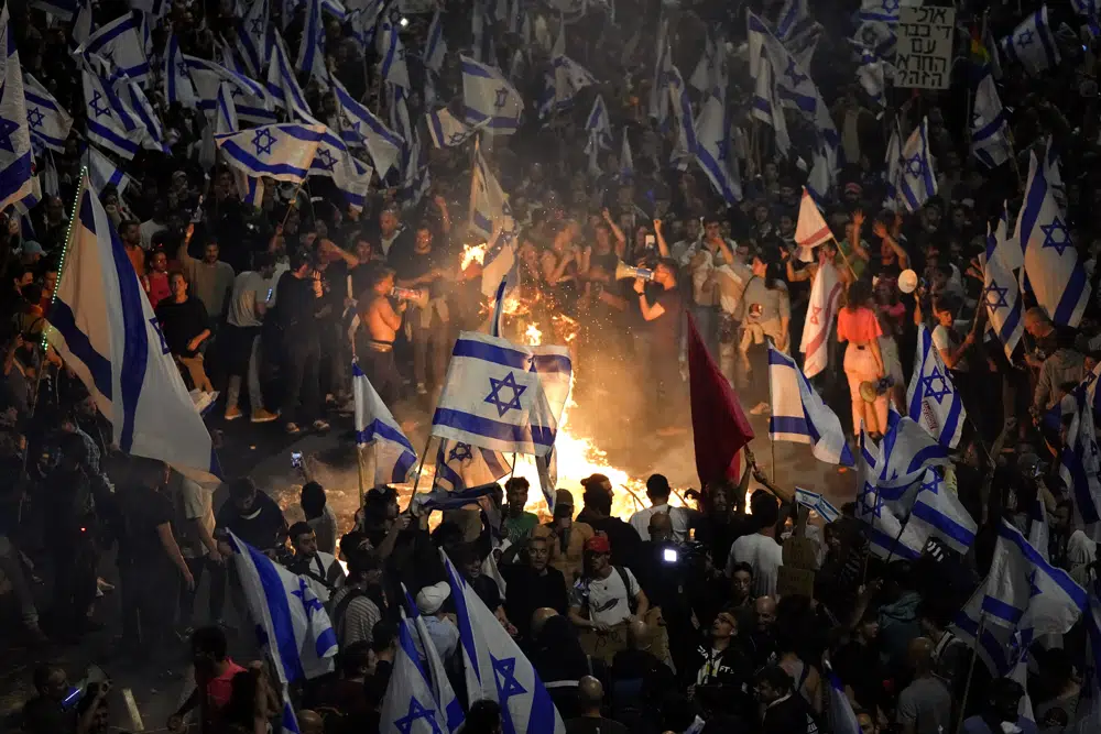 Netanyahu fires defense minister, sparking mass protests