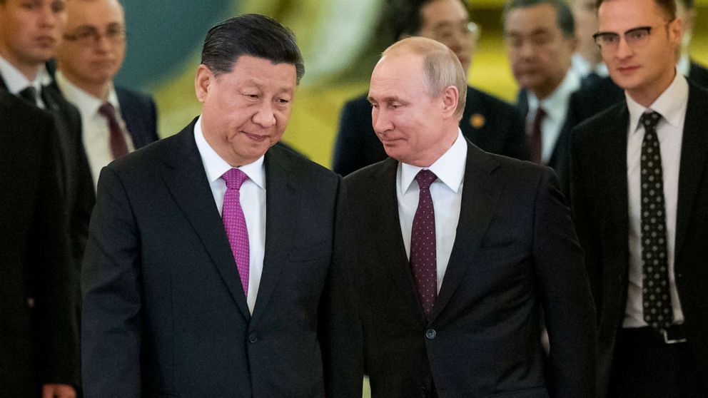 Xi meets with Putin in Moscow