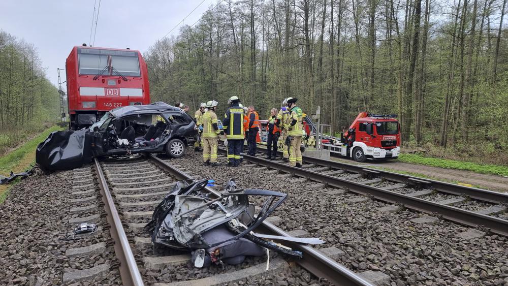 Train hits car at crossing in Germany, kills 3