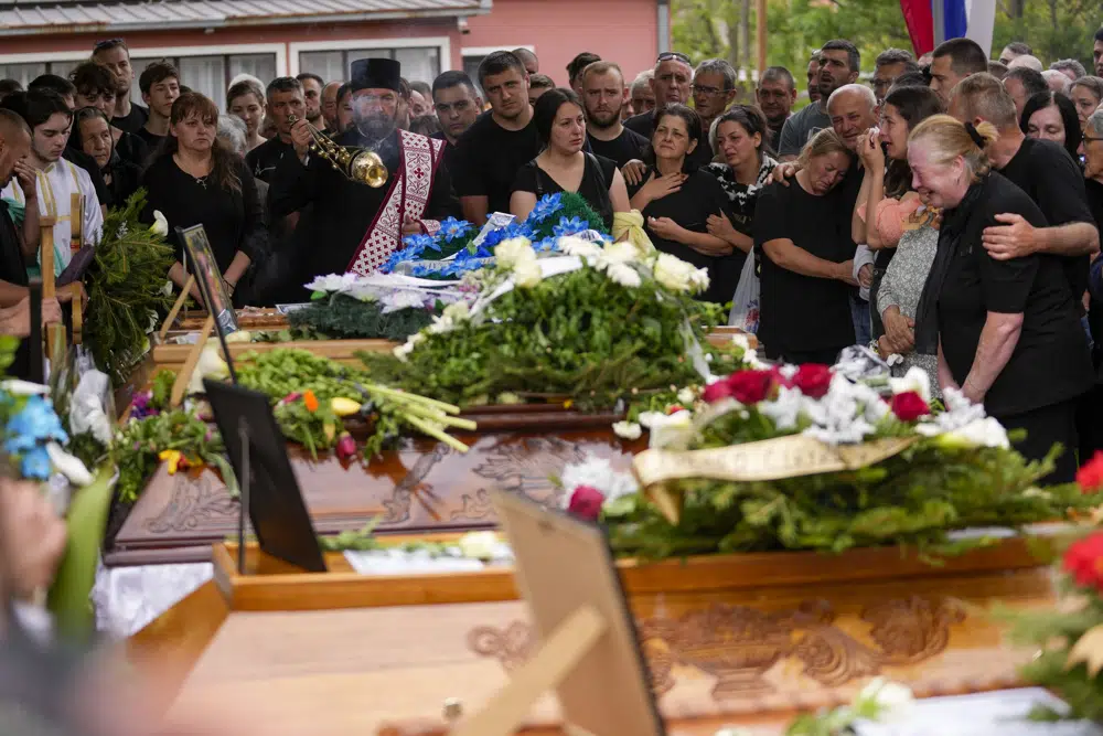 Serbia’s education minister resigns following mass shootings