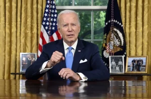 Biden celebrates a 'crisis averted' in his first speech to nation from Oval Office