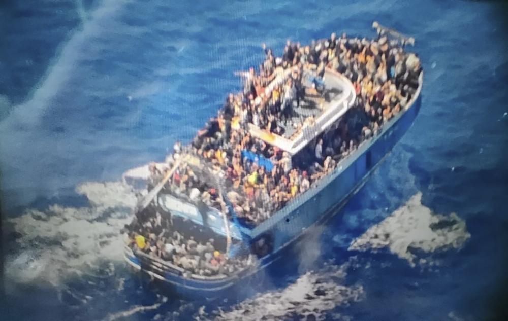 Huge search seeks survivors of migrant boat sinking off Greece