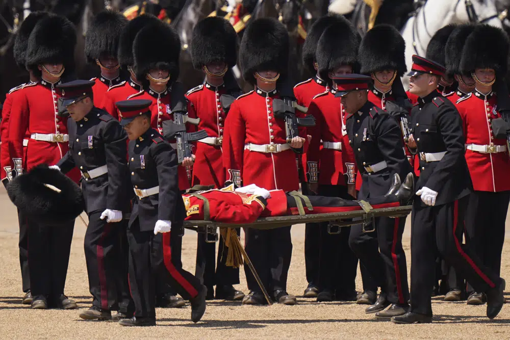 Prince William reviews military parade, soldiers feel heat, several faint