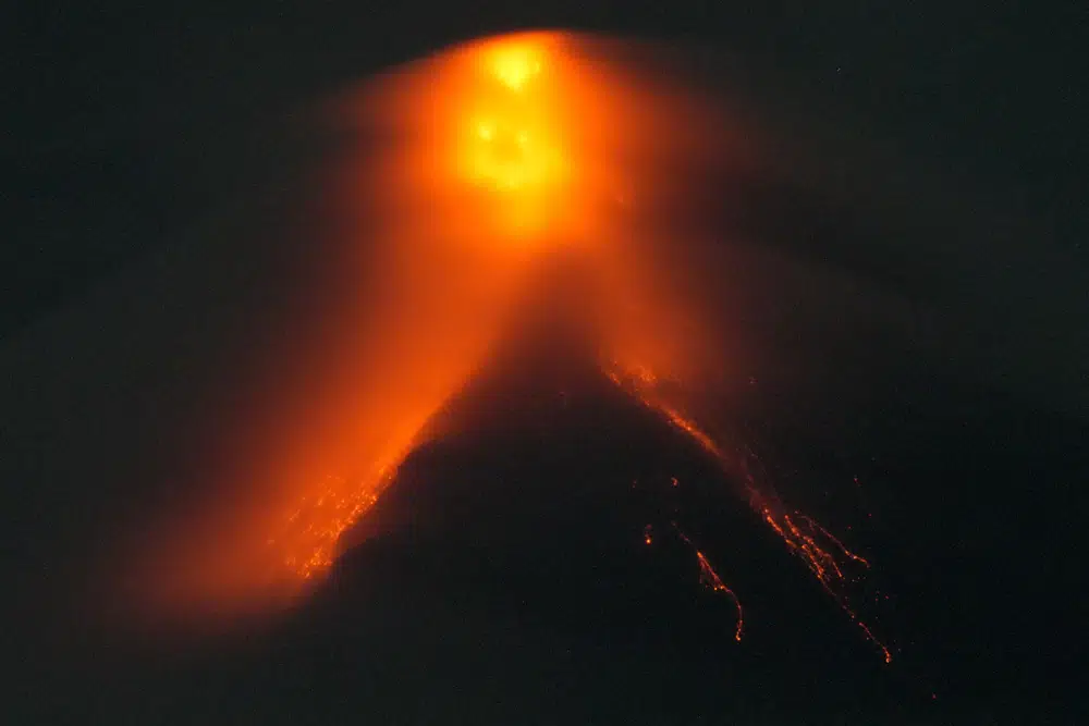 Philippines’ Mayon Volcano spews lava down its slopes, thousands on alert