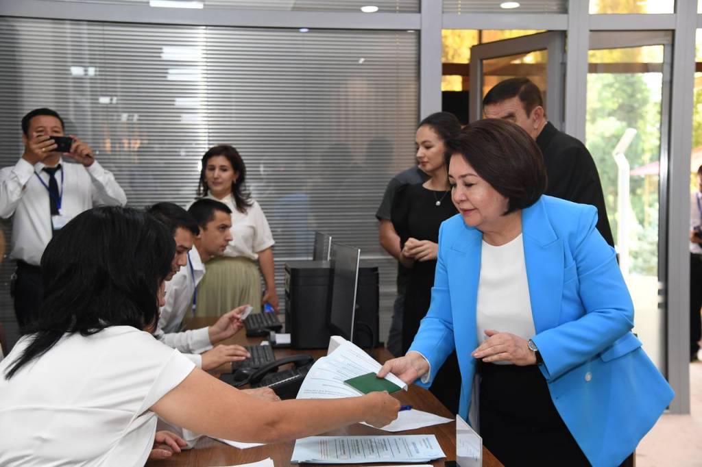 Presidential Candidate Robakhon Makhmudova takes part in voting process