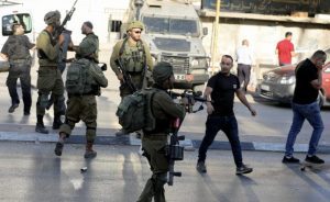 Israel's biggest military raid continues, Palestinian deaths mount