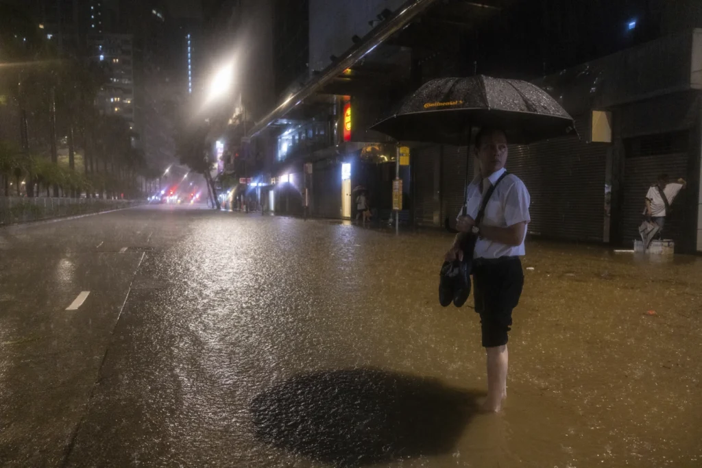 Hong Kong closes schools as torrential rain floods streets