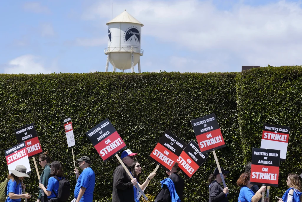 Writers Guild and Hollywood studios reach tentative deal to end strike