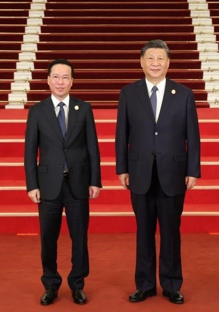 Xi meets Vo Van Thuong in Beijing