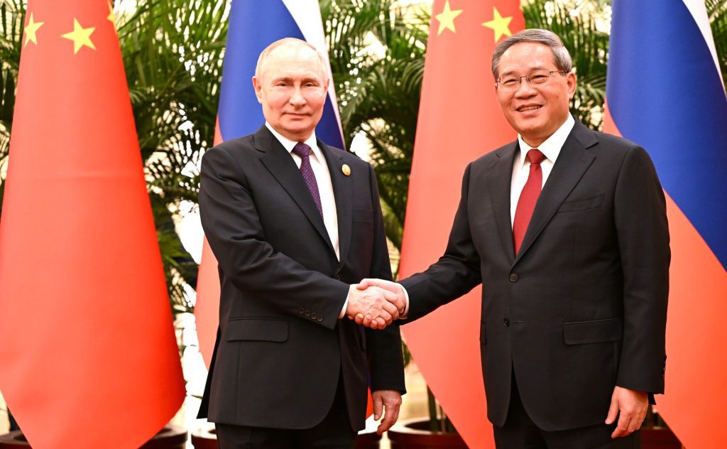 Chinese Premier and Putin Pledge to Deepen Cooperation for Mutual Development