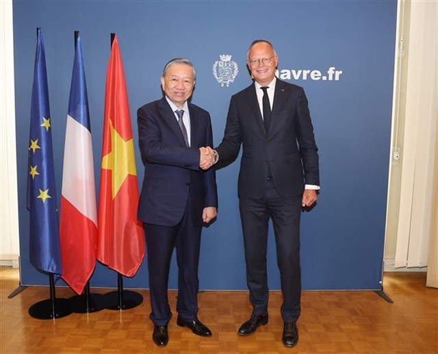President To Lam Meets Le Havre Mayor Édouard Philippe