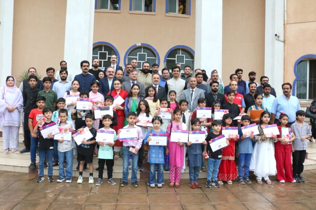 Ambassador Dr. Irfan Neziroglu Graces Certificate Ceremony of Turkish Summer Camp for Children at AIOU